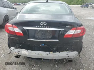 2013 Infiniti M z VIN JN1BY1AR5DM604133, wystawiony jako Copart lot #56890095 z przebiegiem 202 593 mil mil oraz Szkoda całkowita • Salvage title. Historia ofert i sprzedaży dostępna na DreamBid. Obrazek 6.