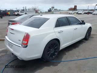 2012 Chrysler 300 Limited with VIN 2C3CCACG2CH237841, listed as a IAAI auction lot 42134640 with 140,554 mi miles. Bid and sale history available at carsss.com. Image 4.
