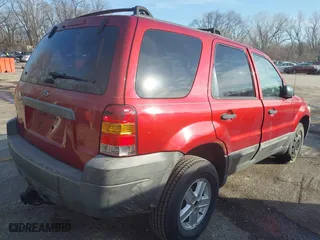 2007 Ford Escape XLS with VIN 1FMYU02Z57KB07963, listed as a IAAI auction lot 41488943 with 123,857 mi miles. Bid and sale history available at carsss.com. Image 4.