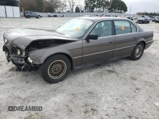 1997 BMW 7 Series 740il with VIN WBAGJ8325VDM01757, listed as a Copart auction lot 85734614 with 190,453 mi miles and Non Repairable. Bid and sale history available at carsss.com. Image 1.