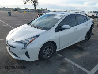 2018 Toyota Prius Two with VIN JTDKARFU1J3066710, listed as a IAAI auction lot 41636185 with 123,399 mi miles. Bid and sale history available at carsss.com. Image 17.