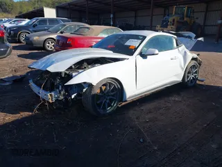 2024 Ford Mustang EcoBoost with VIN 1FA6P8TH5R5125698, listed as a IAAI auction lot 41362654 with 9,604 mi miles. Bid and sale history available at carsss.com. Image 2.