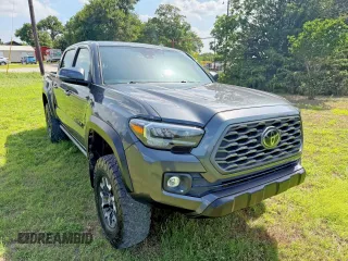 2021 Toyota Tacoma SR with VIN 3TMCZ5AN3MM441215, listed as a Copart auction lot 64744385 with 30,503 mi miles and Salvage title. Bid and sale history available at DreamBid. Image 1.