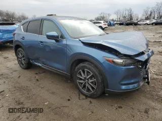 2018 Mazda CX-5 Touring with VIN JM3KFBCM0J0363036, listed as a Copart auction lot 47085755 with 61,928 mi miles and Salvage Title. Bid and sale history available at DreamBid. Image 4.