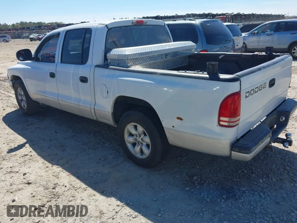 2004 Dodge Dakota SLT with VIN 1D7HL48K54S642754, listed as a IAAI auction lot 41875084 with 242,894 mi miles and . Bid and sale history available at carsss.com. Image 3.