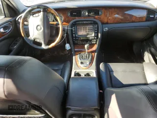 2004 Jaguar XJ with VIN SAJWA73B64TG28182, listed as a Copart auction lot 78380674 with 0 mi miles and Salvage Title. Bid and sale history available at carsss.com. Image 8.