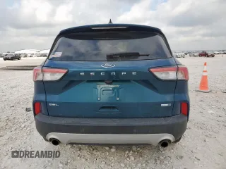 2020 Ford Escape SEL с VIN 1FMCU9H69LUB21780, выставлен на аукционе Copart как лот 58129025 с пробегом 69 511 миль миль и Списание • Salvage title. История ставок и продаж доступна на DreamBid. Изображение 6.