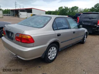 2000 Honda Civic DX with VIN 1HGEJ6620YL001675, listed as a IAAI auction lot 39908648 with 223,579 mi miles. Bid and sale history available at carsss.com. Image 4.