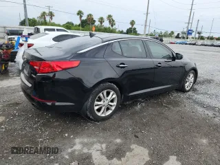 2013 Kia Optima EX z VIN 5XXGN4A79DG162815, wystawiony jako Copart lot #59282275 z przebiegiem 163 920 mil mil oraz Szkoda całkowita • Salvage title. Historia ofert i sprzedaży dostępna na DreamBid. Obrazek 3.