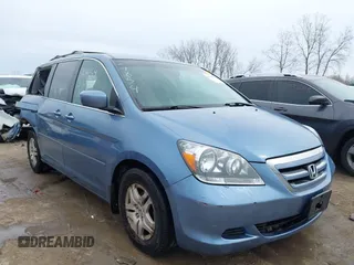 2007 Honda Odyssey EX-L z VIN 5FNRL387X7B122880, wystawiony jako IAAI lot #41967578 z przebiegiem 169 225 mil mil oraz . Historia ofert i sprzedaży dostępna na DreamBid. Obrazek 1.