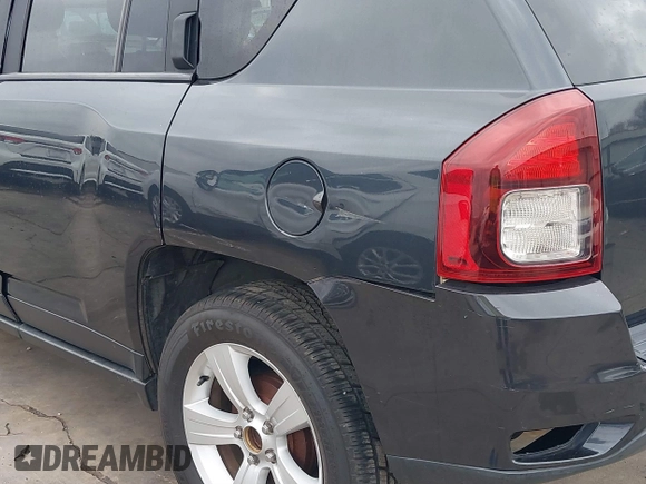 2014 Jeep Compass Sport with VIN 1C4NJCBB0ED647937, listed as a IAAI auction lot 41444062 with 135,679 mi miles and . Bid and sale history available at DreamBid. Image 17.
