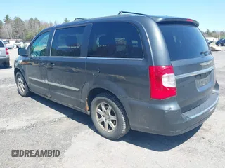 2012 Chrysler Town & Country Touring with VIN 2C4RC1BG4CR189809, listed as a IAAI auction lot 42093962 with 180,324 mi miles. Bid and sale history available at carsss.com. Image 3.