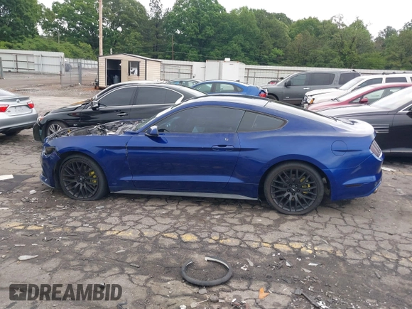 2015 Ford Mustang V6 with VIN 1FA6P8AM2F5321402, listed as a IAAI auction lot 42215558 with 137,209 mi miles and . Bid and sale history available at DreamBid. Image 14.