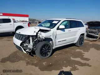 2018 Jeep Grand Cherokee Laredo E with VIN 1C4RJFAGXJC435658, listed as a IAAI auction lot 40659459 with 97,827 mi miles. Bid and sale history available at carsss.com. Image 17.