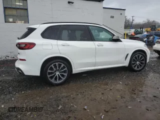 2020 BMW X5 M50i with VIN 5UXJU4C08L9C39129, listed as a Copart auction lot 48999914 with 32,851 mi miles and Salvage Title. Bid and sale history available at carsss.com. Image 3.