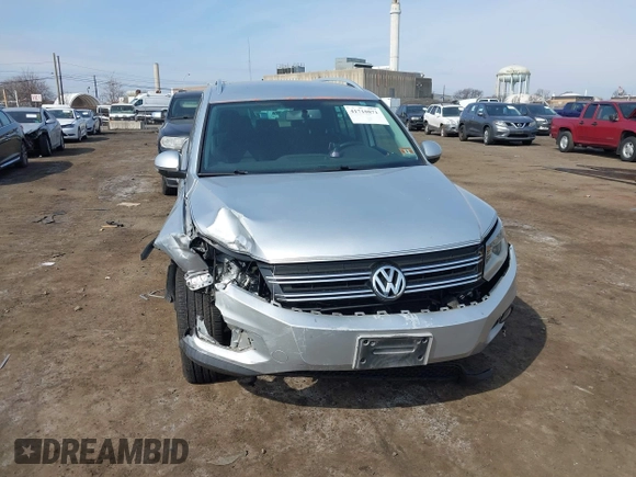 2012 Volkswagen Tiguan S z VIN WVGBV7AX9CW571627, wystawiony jako IAAI lot #41710871 z przebiegiem 157 998 mil mil oraz . Historia ofert i sprzedaży dostępna na DreamBid. Obrazek 12.