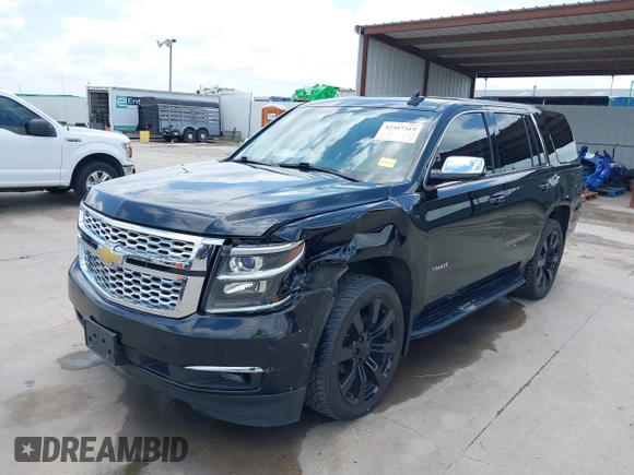 2015 Chevrolet Tahoe with VIN 1GNSK2KC4FR610534, listed as a IAAI auction lot 42357319 with 140,479 mi miles and . Bid and sale history available at DreamBid. Image 18.
