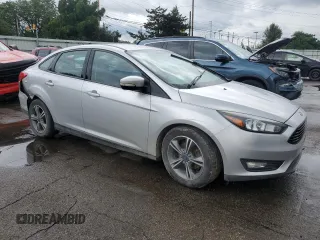 2016 Ford Focus SE with VIN 1FADP3FE5GL233081, listed as a Copart auction lot 65498195 with 89,674 mi miles and Salvage title. Bid and sale history available at DreamBid. Image 4.