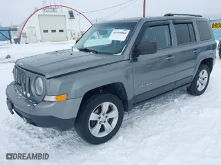 2014 Jeep Patriot Sport with VIN 1C4NJRBB3ED511529, listed as a IAAI auction lot 41494084 with 183,561 mi miles. Bid and sale history available at carsss.com. Image 2.