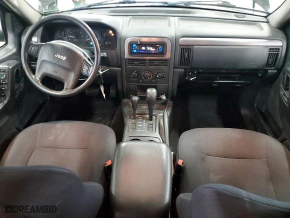 2003 Jeep Grand Cherokee Laredo with VIN 1J4GW48S23C613471, listed as a Copart auction lot 49521865 with 189,918 mi miles and Salvage Title. Bid and sale history available at carsss.com. Image 8.