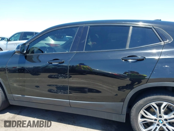 2018 BMW X2 sDrive28i with VIN WBXYJ3C35JEJ82700, listed as a IAAI auction lot 42675146 with 84,961 mi miles and . Bid and sale history available at DreamBid. Image 15.