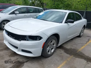 2023 Dodge Charger SXT with VIN 2C3CDXBG3PH518747, listed as a IAAI auction lot 42174270 with 51,956 mi miles. Bid and sale history available at carsss.com. Image 17.
