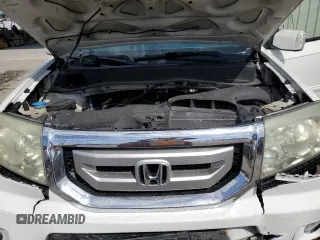 2009 Honda Pilot EX-L z VIN 5FNYF38689B015467, wystawiony jako Copart lot #50824945 z przebiegiem 150 853 mil mil oraz Szkoda całkowita • Salvage title. Historia ofert i sprzedaży dostępna na DreamBid. Obrazek 12.