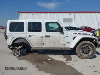 2021 Jeep Wrangler Unlimited Rubicon with VIN 1C4HJXFG7MW531678, listed as a IAAI auction lot 41781874 with 32,440 mi miles and . Bid and sale history available at DreamBid. Image 13.