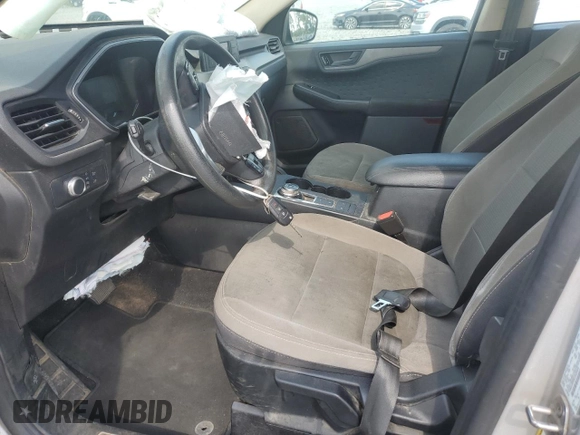 2020 Ford Escape S with VIN 1FMCU0F69LUA22424, listed as a Copart auction lot 57398275 with 136,761 mi miles and Salvage title. Bid and sale history available at DreamBid. Image 7.