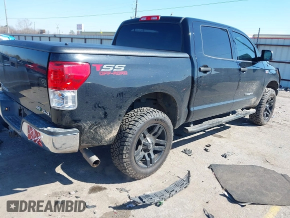 2013 Toyota Tundra 4WD Truck with VIN 5TFDW5F12DX309382, listed as a IAAI auction lot 41631661 with 158,821 mi miles. Bid and sale history available at carsss.com. Image 4.