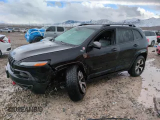 2014 Jeep Cherokee Trailhawk with VIN 1C4PJMBS1EW211570, listed as a Copart auction lot 51465845 with 156,320 mi miles and Salvage Title. Bid and sale history available at carsss.com. Image 1.