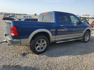 2009 Dodge Ram 1500 Laramie with VIN 1D3HB13T89J521779, listed as a Copart auction lot 48239135 with 144,414 mi miles and Salvage Title. Bid and sale history available at carsss.com. Image 3.