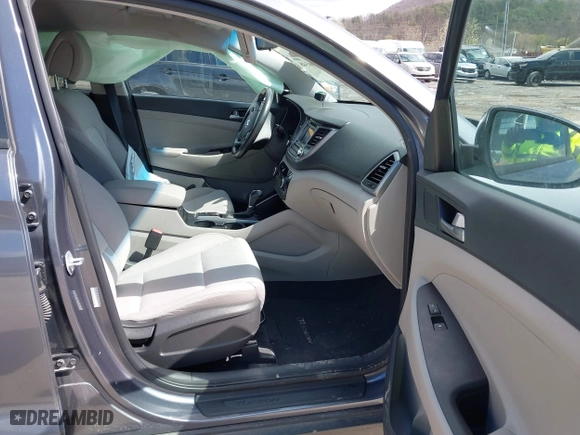 2016 Hyundai Tucson Sport with VIN KM8J33A2XGU022633, listed as a IAAI auction lot 41990348 with 73,395 mi miles. Bid and sale history available at carsss.com. Image 5.