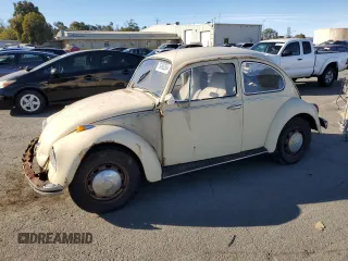 1969 Volkswagen Beetle with VIN 1190494912, listed as a Copart auction lot 75495264 with 67,827 mi miles and Salvage Title. Bid and sale history available at DreamBid. Image 1.