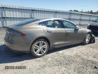 2016 Tesla Model S 90D with VIN 5YJSA1E2XGF121040, listed as a Copart auction lot 53612085 with 158,710 mi miles and Salvage Title. Bid and sale history available at DreamBid. Image 3.