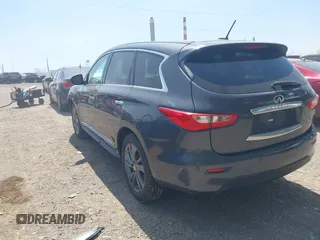 2013 Infiniti JX35 with VIN 5N1AL0MM1DC306701, listed as a IAAI auction lot 42131992 with 177,357 mi miles. Bid and sale history available at carsss.com. Image 3.