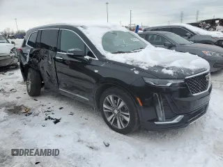 2021 Cadillac XT6 Premium Luxury with VIN 1GYKPDRS3MZ165049, listed as a Copart auction lot 45456145 with 57,112 mi miles and Salvage title. Bid and sale history available at DreamBid. Image 4.