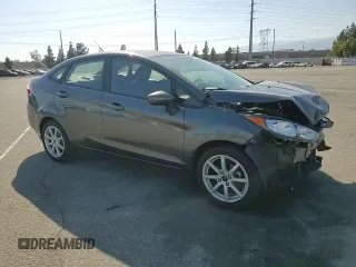 2019 Ford Fiesta SE z VIN 3FADP4BJ4KM106189, wystawiony jako Copart lot #57913315 z przebiegiem Nie podano mil oraz Szkoda całkowita • Salvage title. Historia ofert i sprzedaży dostępna na DreamBid. Obrazek 14.