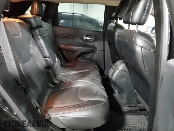 2015 Jeep Cherokee Trailhawk with VIN 1C4PJMBS5FW587545, listed as a Copart auction lot 58820685 with 136,755 mi miles and Salvage title. Bid and sale history available at DreamBid. Image 11.