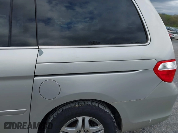 2005 Honda Odyssey EX-L with VIN 5FNRL38795B083325, listed as a IAAI auction lot 42034632 with 183,865 mi miles. Bid and sale history available at carsss.com. Image 14.