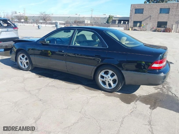 2000 Lexus ES 300 with VIN JT8BF28G2Y5093962, listed as a IAAI auction lot 41634264 with 106,951 mi miles. Bid and sale history available at carsss.com. Image 3.