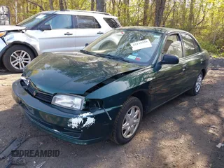 2000 Mitsubishi Mirage DE z VIN JA3AY26C2YU026564, wystawiony jako IAAI lot #42139336 z przebiegiem 53 947 mil mil oraz . Historia ofert i sprzedaży dostępna na DreamBid. Obrazek 2.
