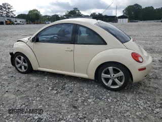 2006 Volkswagen Beetle with VIN 3VWSR31C56M422745, listed as a Copart auction lot 57027055 with 256,916 mi miles and Salvage title. Bid and sale history available at DreamBid. Image 2.