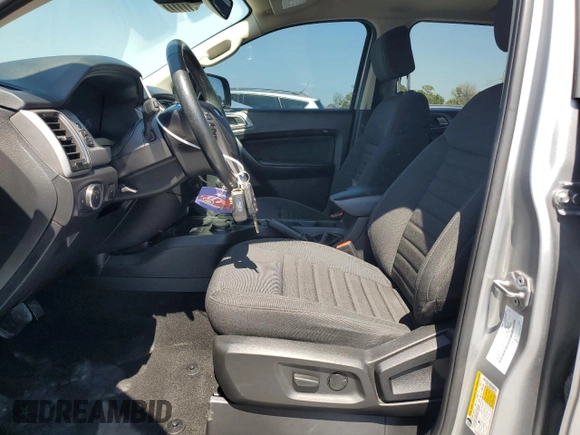 2023 Ford Ranger XL with VIN 1FTER4FH3PLE03480, listed as a Copart auction lot 57113605 with 32,540 mi miles and Salvage title. Bid and sale history available at DreamBid. Image 7.