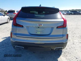2024 Cadillac XT4 FWD Premium Luxury with VIN 1GYFZCR44RF130066, listed as a IAAI auction lot 41735148 with 32,157 mi miles and . Bid and sale history available at carsss.com. Image 16.