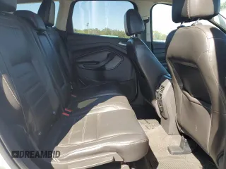2017 Ford Escape Titanium with VIN 1FMCU0J90HUB04082, listed as a Copart auction lot 77814994 with 135,674 mi miles and Salvage Title. Bid and sale history available at carsss.com. Image 11.