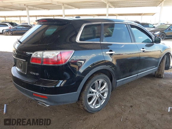 2011 Mazda CX-9 Grand Touring with VIN JM3TB2DV7B0306387, listed as a IAAI auction lot 42428565 with 167,658 mi miles and . Bid and sale history available at DreamBid. Image 4.