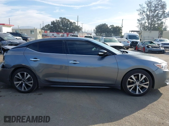 2017 Nissan Maxima SV with VIN 1N4AA6AP4HC404371, listed as a IAAI auction lot 41489579 with 117,677 mi miles. Bid and sale history available at carsss.com. Image 13.
