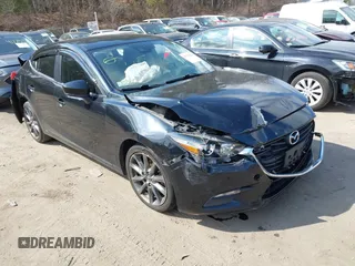 2018 Mazda 3 Touring with VIN 3MZBN1V34JM261565, listed as a IAAI auction lot 41795238 with 121,112 mi miles. Bid and sale history available at carsss.com. Image 1.
