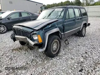 1996 Jeep Cherokee Country with VIN 1J4FJ78S7TL242853, listed as a Copart auction lot 73022554 with 84,868 mi miles and Salvage Title. Bid and sale history available at carsss.com. Image 12.